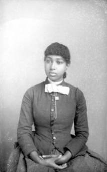 seated-with-bow-harper-alvan-s-photographed-in-tallahassee-florida-between-1885-and-1910